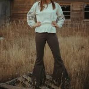 Brown colored bell bottoms size 16